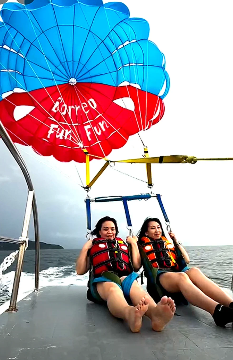Parasailing canopy flying above the sea